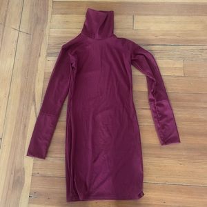 Mini dress with roll neck rib.